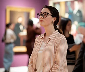 Woman observing art